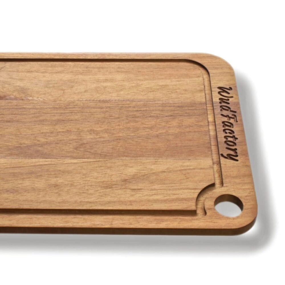 Sustainable teak cutting board with stylish design.