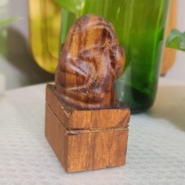 Wooden Ganesha Statue – Divine idol symbolizing prosperity
