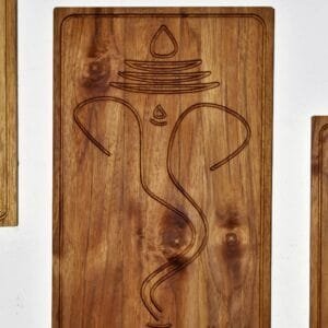 Close-up of Wooden Antique Ganesha wall frame with intricate detailing