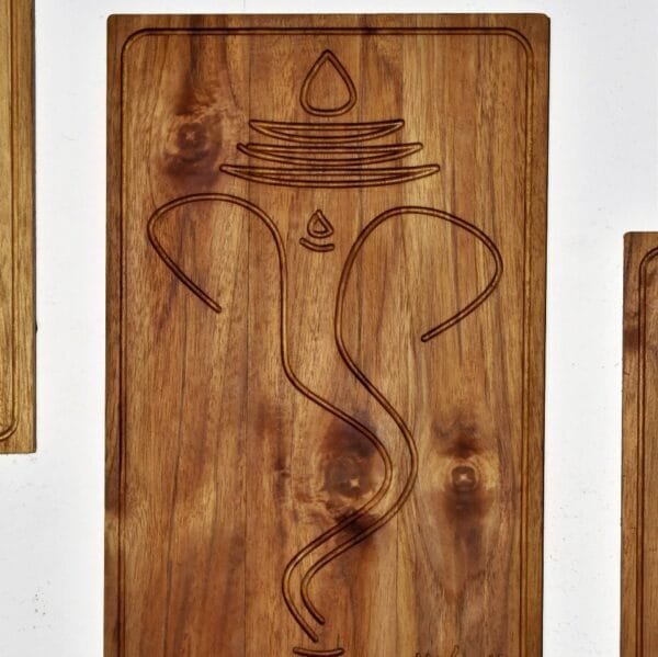 Close-up of Wooden Antique Ganesha wall frame with intricate detailing